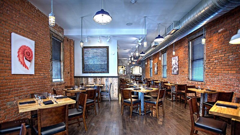 Dining room with many set tables