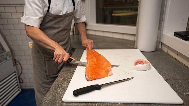 Staff preparing fresh fish